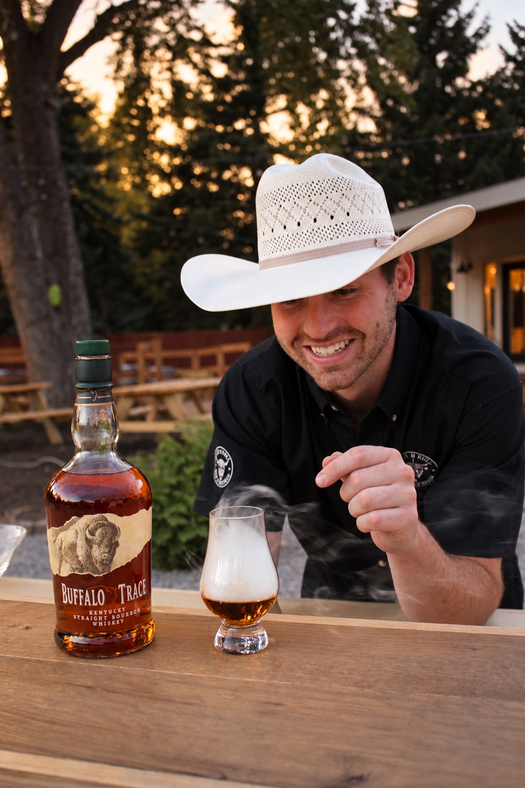 Bear n Bull bartender presenting a bourbon pour beside a bottle of Buffalo Trace.